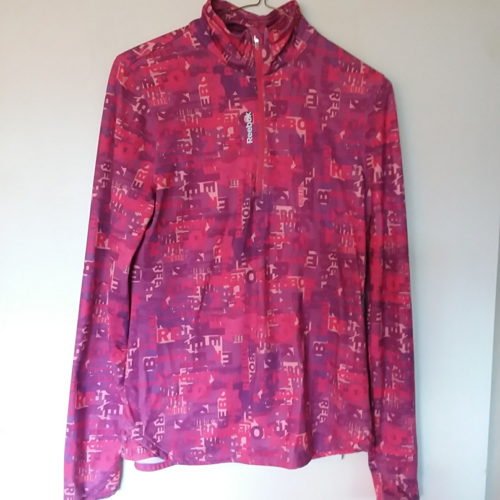 REEBOK  stylish top. Size medium.  Great hot pink color.